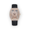 Reloj LOTO COMPANY BLOOM con esfera floral, bisel de cristales brillantes y correa de piel negra con textura.