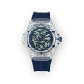 Reloj LOTO COMPANY VELOCE / 2540-1 con caja transparente de policarbonato y correa de silicona azul. Mecanismo expuesto y dial esqueletizado.